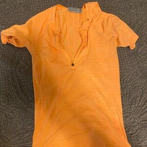 Athleta Orange Pacifica workout/rash guard top